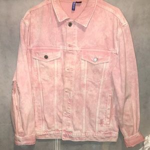 Pink wash distressed denim jacket